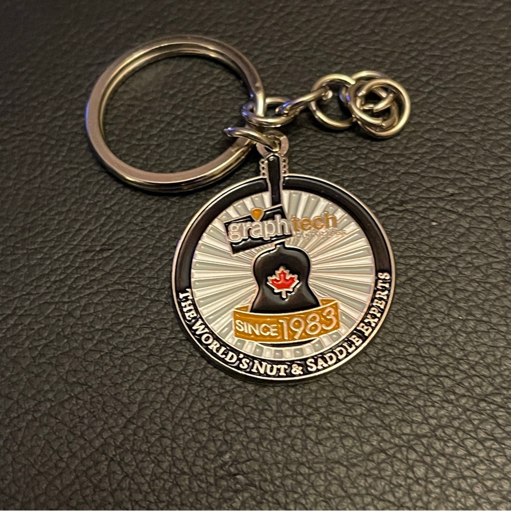 New Graphtech keychain Since 1983 Guitar Brand